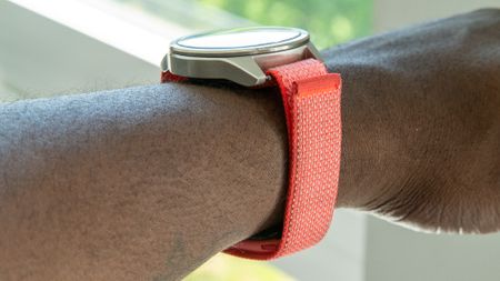 Google Fitbit Air band with an analogue watch