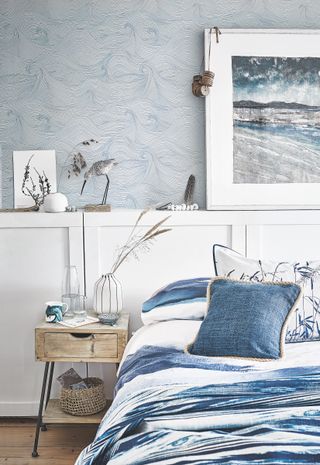 bedroom with wave patterned wallpaper