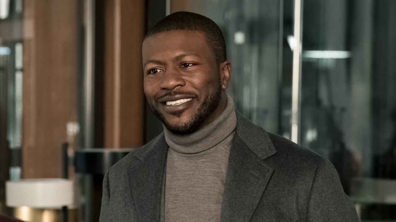 Langston smiling as a twitterpated Olympia in Matlock Season 2x13