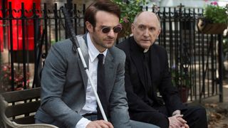 Charlie Cox as Matt Murdoch with priest in Daredevil