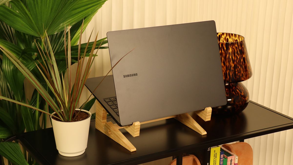 Samsung Galaxy Book3 on a wooden stand