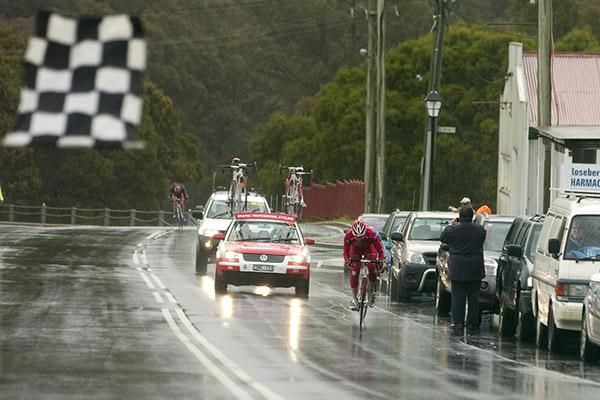 Rhys Pollock (Drapac Porsche) sprints towards the line in Rosebery in horrendous conditions.