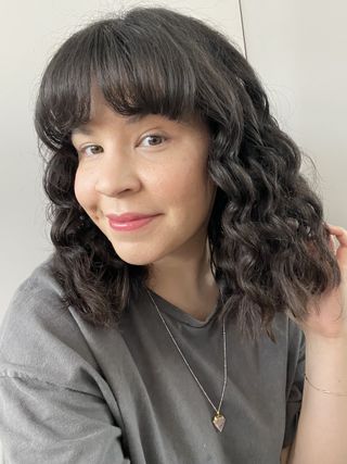 Mica Ricketts after using the Living Proof Perfect Hair Day High-Shine Gloss