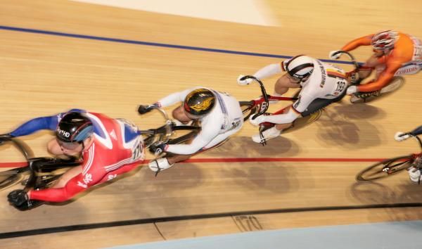 Chris Hoy (Great Britain) heads to yet another gold medal in the men's Keirin with Azizulhasni Awang (Malaysia) and Max Levy (Germany).