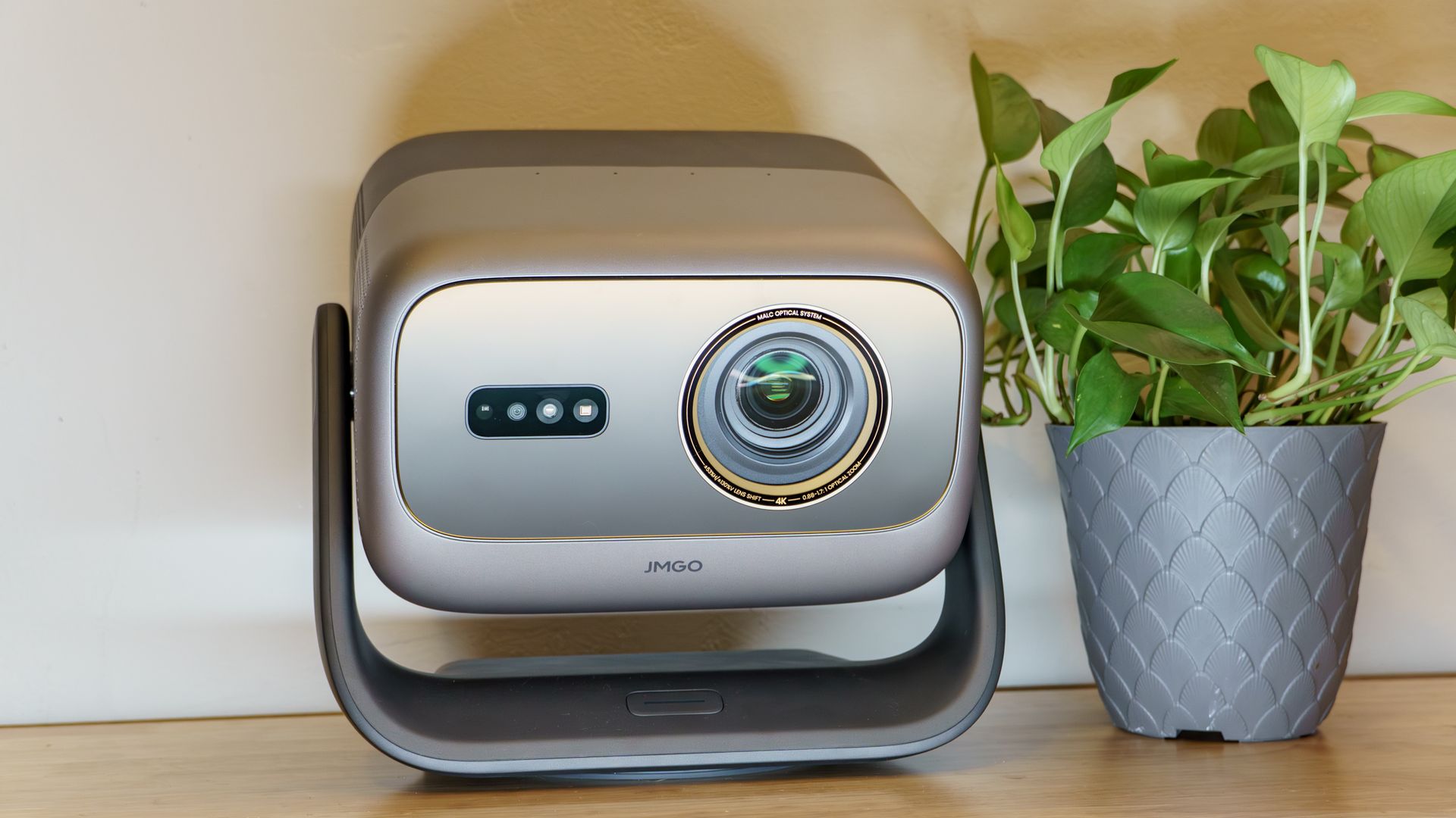 A JMGO N3 Ultimate projector on a desk