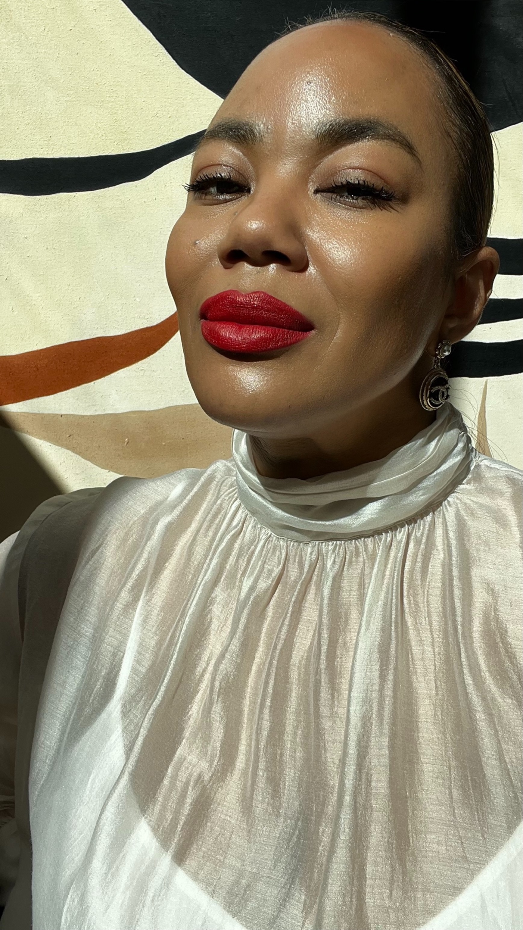 Tasha Reiko Brown wearing a thin eyeliner wing.