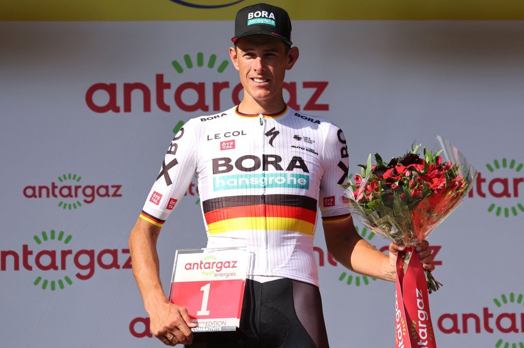 BoraHansgrohe teams German rider Nils Politt celebrates on the podium with the most competitive rider award after the 15th stage of the 109th edition of the Tour de France cycling race 2025 km between Rodez and Carcassonne in southern France on July 17 2022 Photo by Thomas SAMSON AFP Photo by THOMAS SAMSONAFP via Getty Images