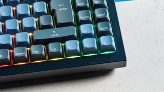 A black and blue Keychron Q7 wired mechanical keyboard that's made of metal