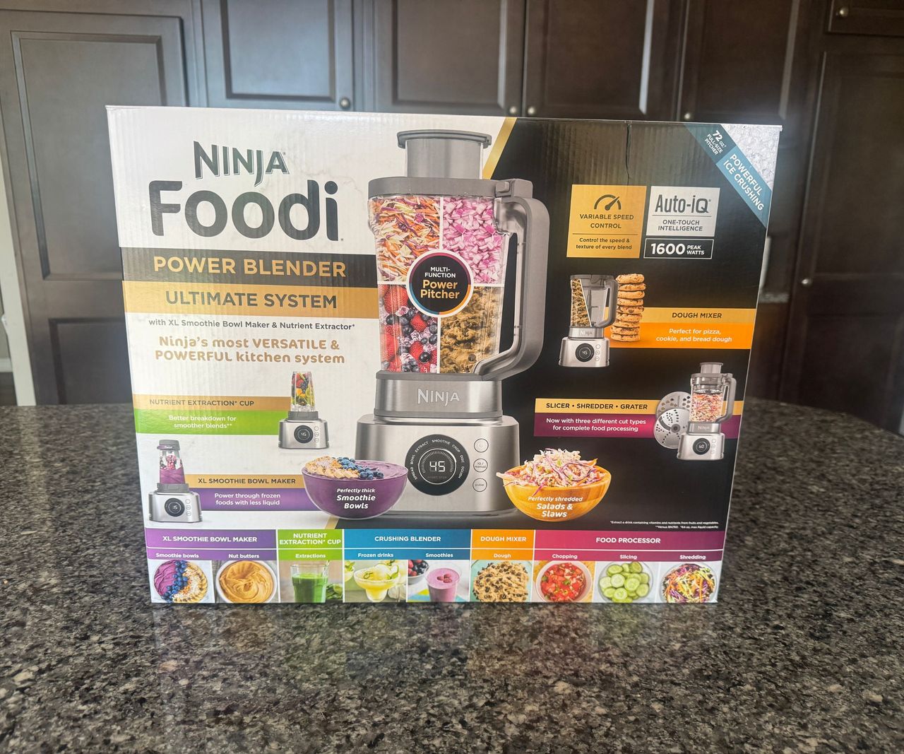 The colorful box for the Ninja Foodi Power Blender Ultimate System on a kitchen counter.