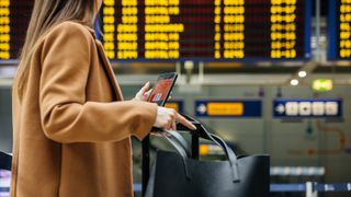 woman's handbag in airport