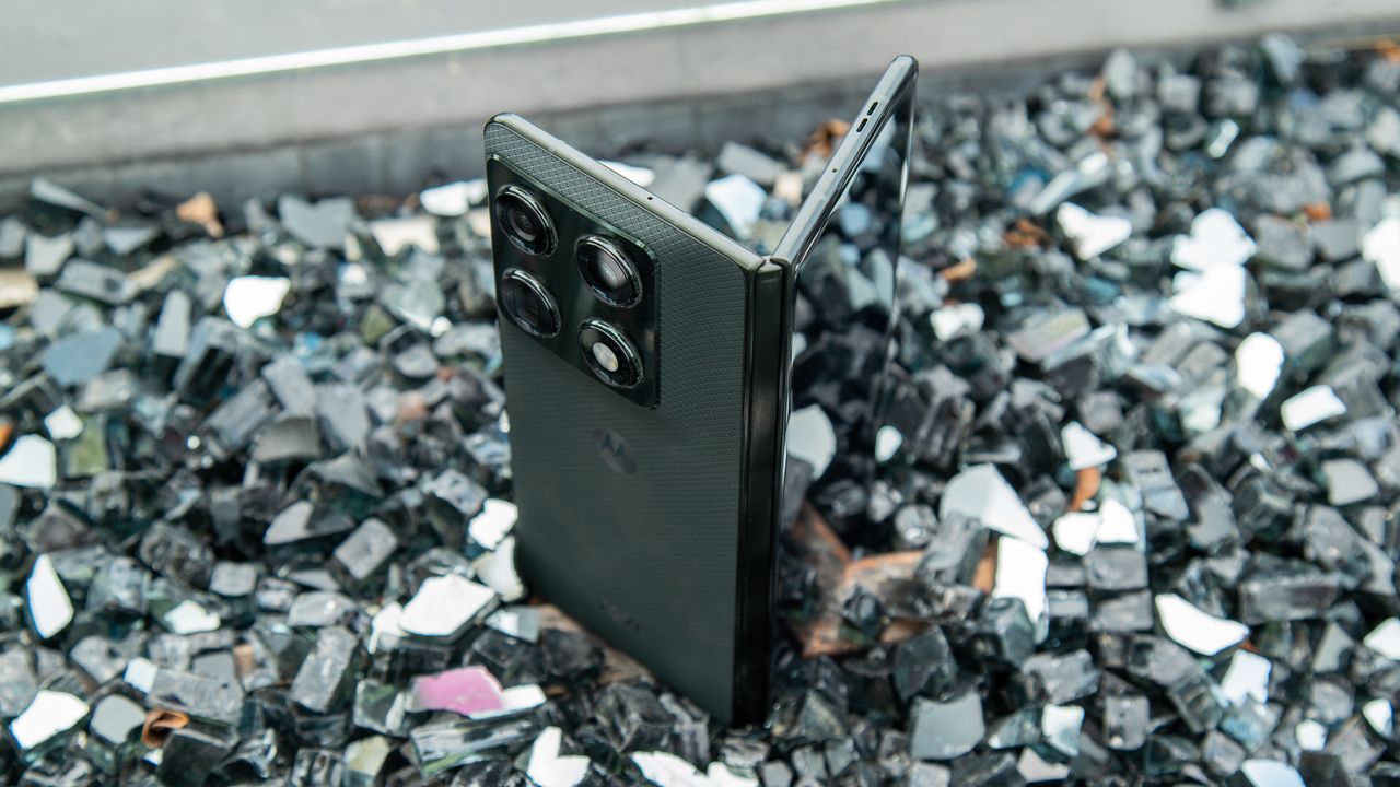 Motorola Razr Fold on a pile of black crystal rocks