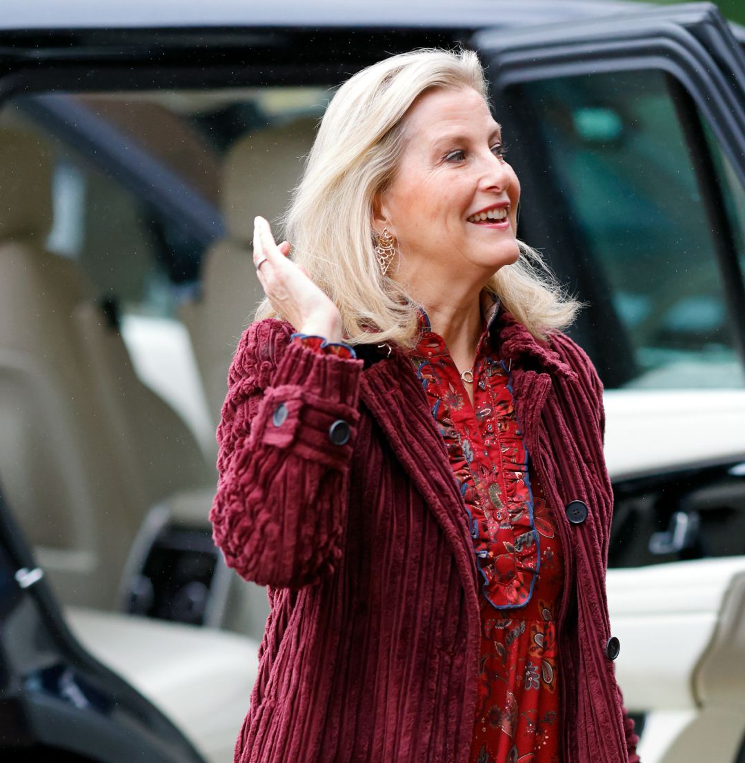 Duchess Sophie wearing a red coat and dress