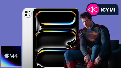Superman sits in a chair looking at the iPad Pro and M4 chip