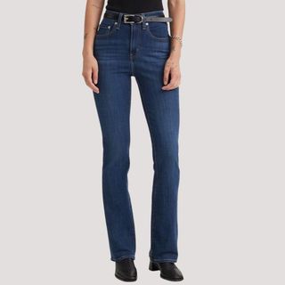 Flat lay image of denim flared jeans 