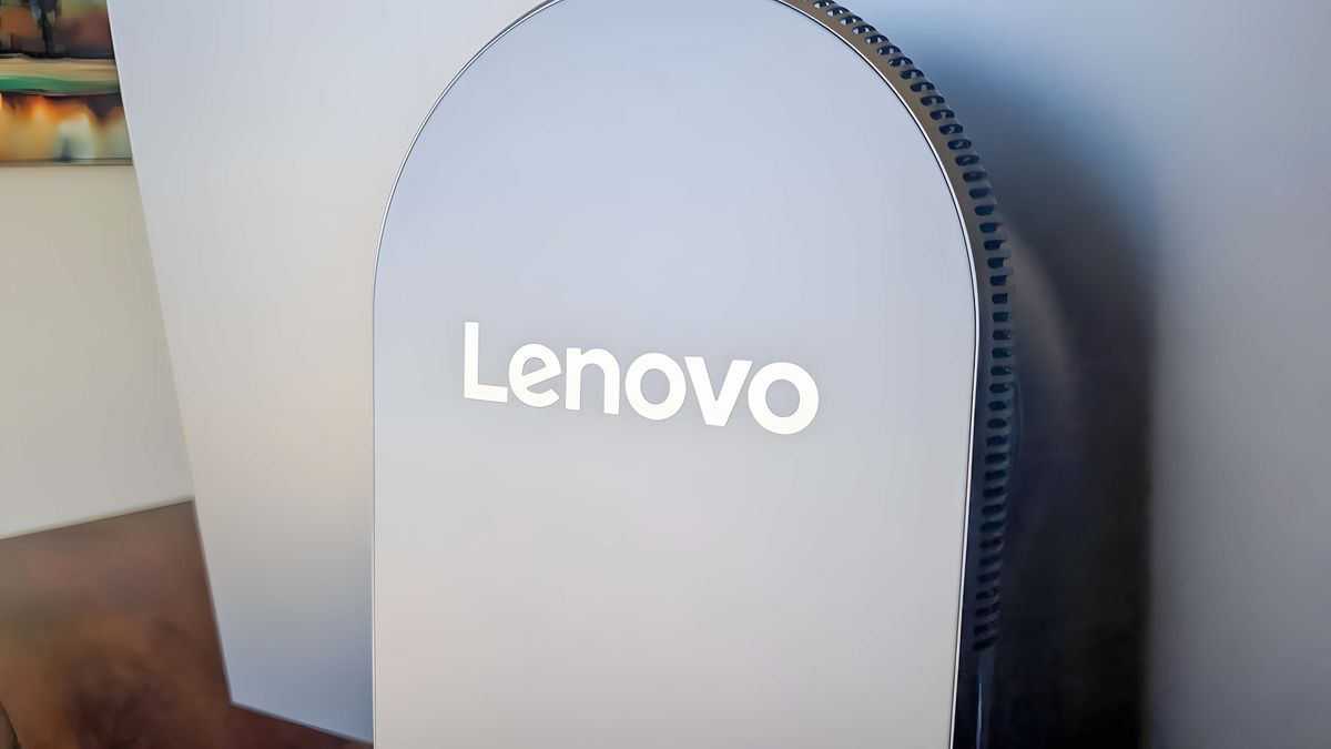A closeup of the Lenovo logo on the back of the Lenovo Yoga AIO 27".