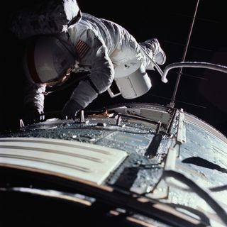 Ronald E. Evans during an EVA as the Apollo 17 spacecraft begins its journey back to Earth.