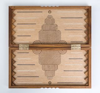 Open wooden box with pattern