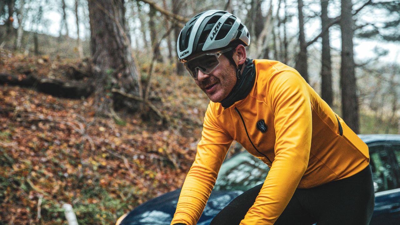 Image shows a happy cyclist