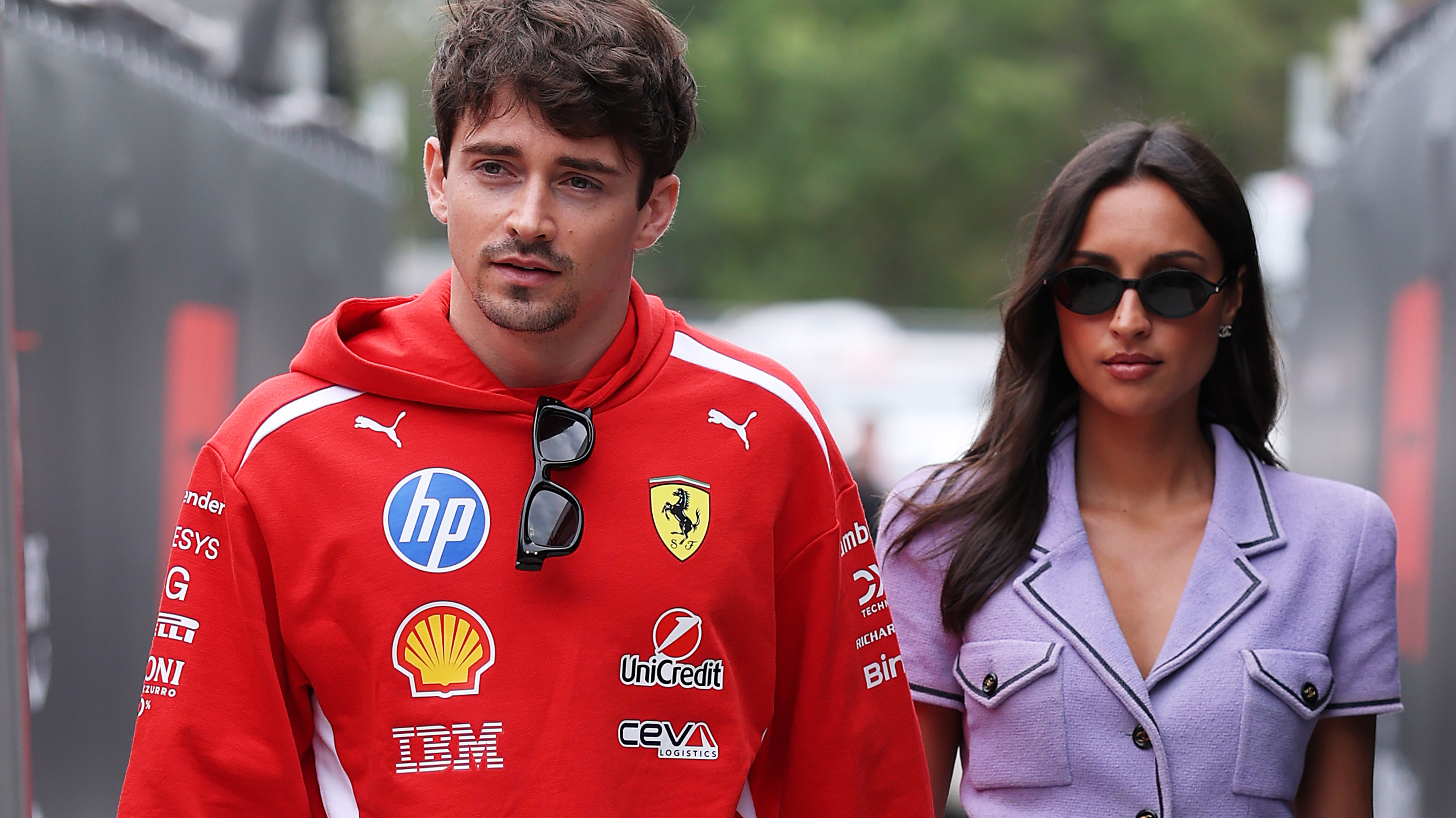 Charles Leclerc of Monaco and Scuderia Ferrari and Alexandra Leclerc arrive in the Paddock prior to final practice ahead of the F1 Grand Prix of Australia at Albert Park Grand Prix Circuit on March 07, 2026 in Melbourne, Australia. 