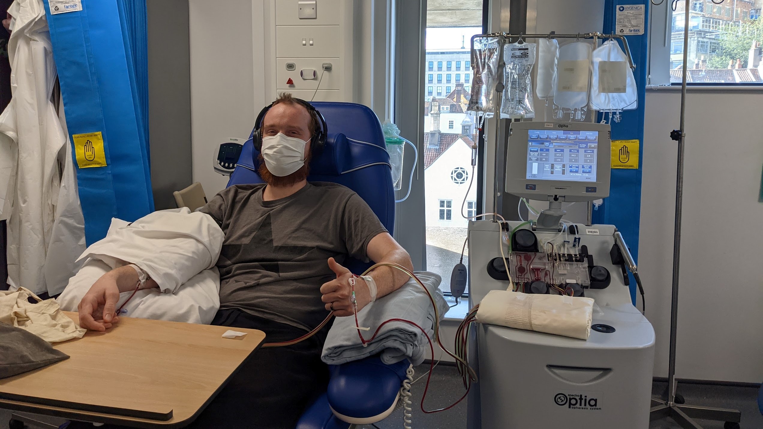 Photo of me, Christian, having my stem cells harvested in a hospital chair.
