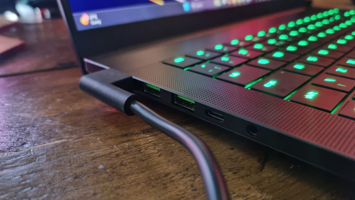 The left hand side of the Razer Blade 16 2026 gaming laptop, showing the USB ports and power cable