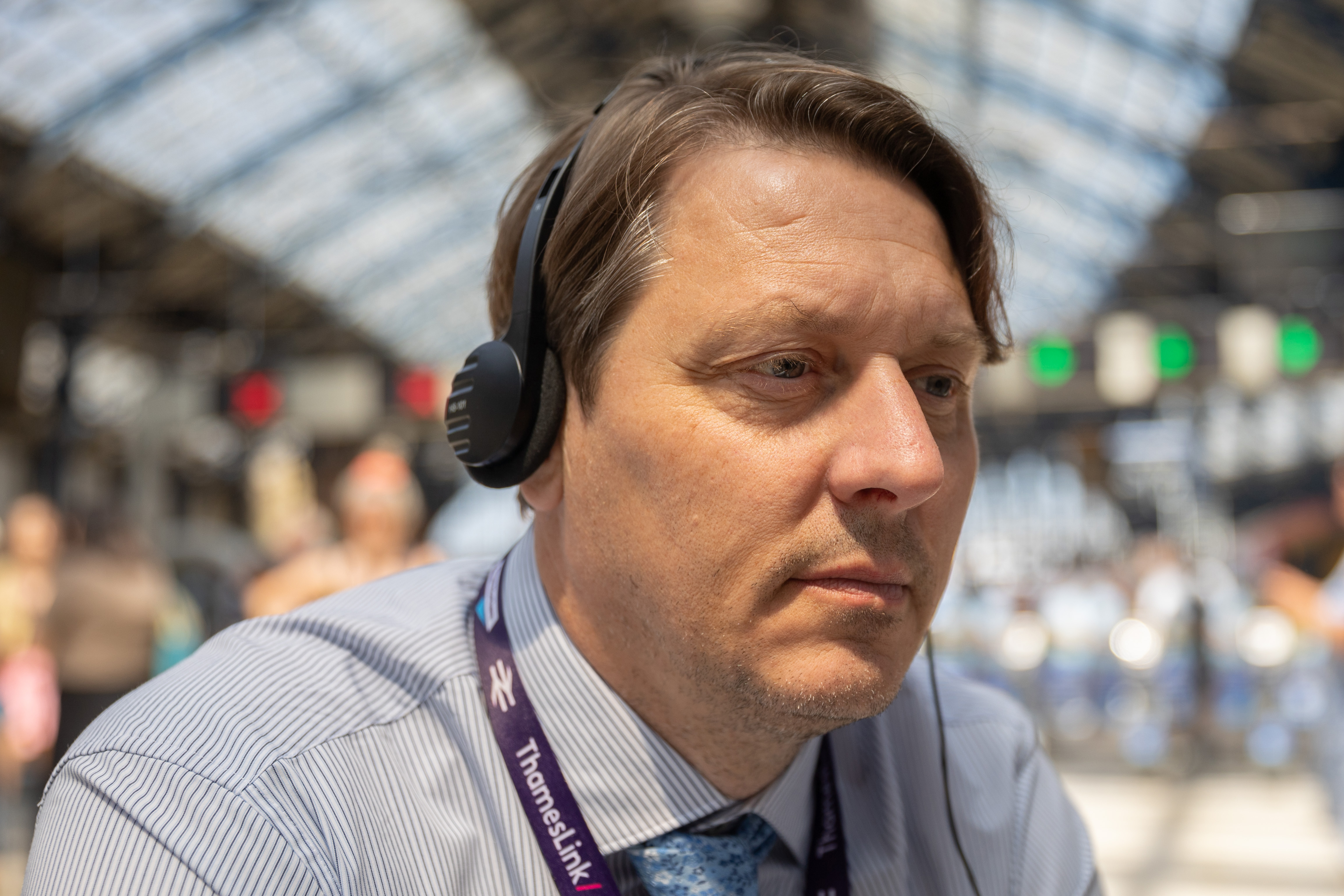 Hearing disabled people using Ampetronic | Listen Technologies solutions at Brighton Station.