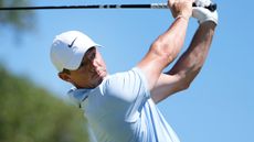 Rory McIlroy takes a shot in a practice round for the Valero Texas Open