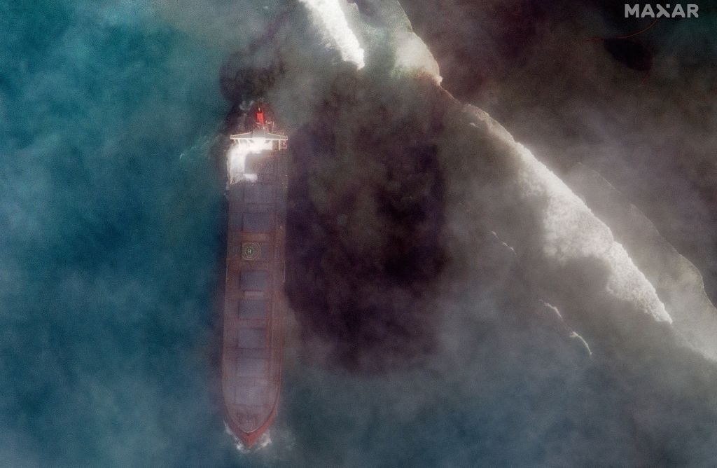 A bulk carrier ship, MV Wakashio, that recently ran aground off the southeast coast of Mauritius has been spilling oil into the sea, as seen in satellite images captured by Maxar Technologies on Aug. 7, 2020.