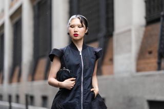 Person in paris wearing graphic eyeliner makeup