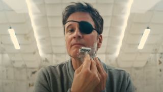 Colin Firth shaves himself while wearing an eye patch in Kingsman: The Golden Circle.