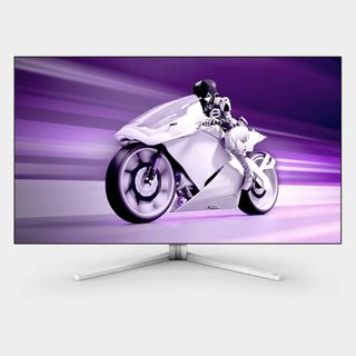 Philips Evnia 42M2N8900with with white motorbike and purple backdrop on screen