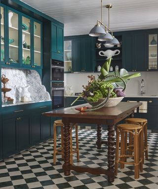 Blue cabinets, wooden kitchen island