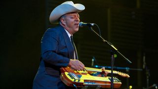  Junior Brown performs during the Domino Effect benefit concert at the New Orleans Arena on May 30, 2009 in New Orleans, Louisiana.