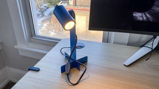 an ikea desk lamp on a desk