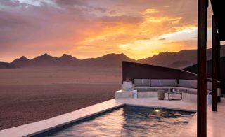Each suite has a private pool, butler hatch, outdoor shower, skylight for in-bed stargazing, and floor-to-ceiling sliding glass doors that frame those otherworldly views