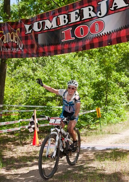 Cheryl Sornson (Team CF) rides to a win in the Lumberjack 100