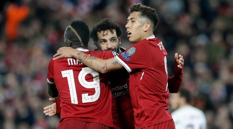 Sadio Mane, Mohamed Salah and Roberto Firmino celebrate a goal for Liverpool against Roma in the Champions League in April 2018.