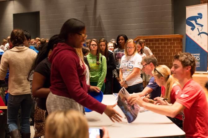 Team USA signing autographs at Elizabeth Davis Middle School