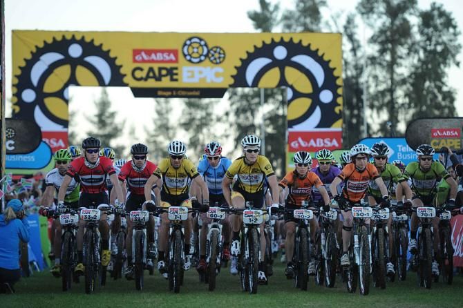 The front bunch rides down start chute during stage 1