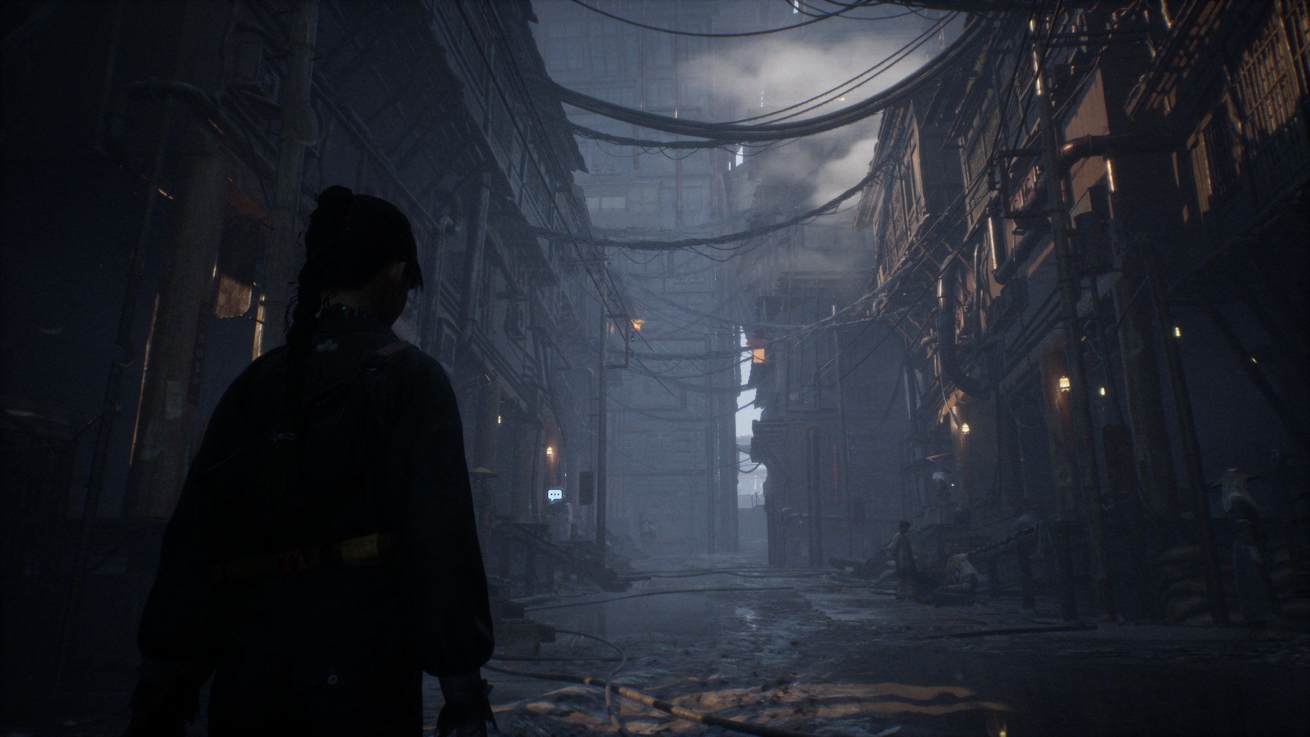 A woman stands in a ruined urban environment