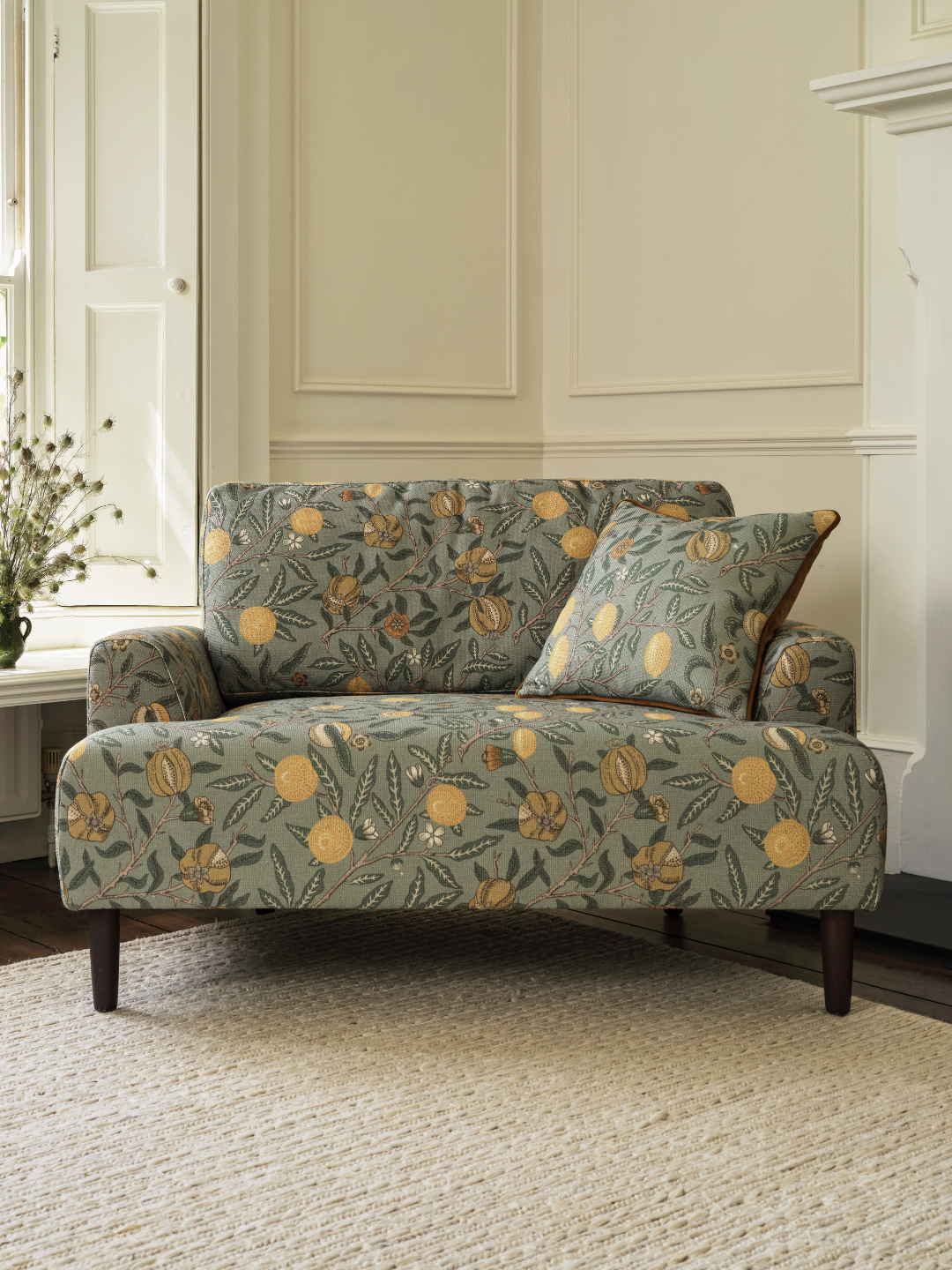 A lemon and fruit patterned loveseat from Swyft and Morris &amp;amp; Co.