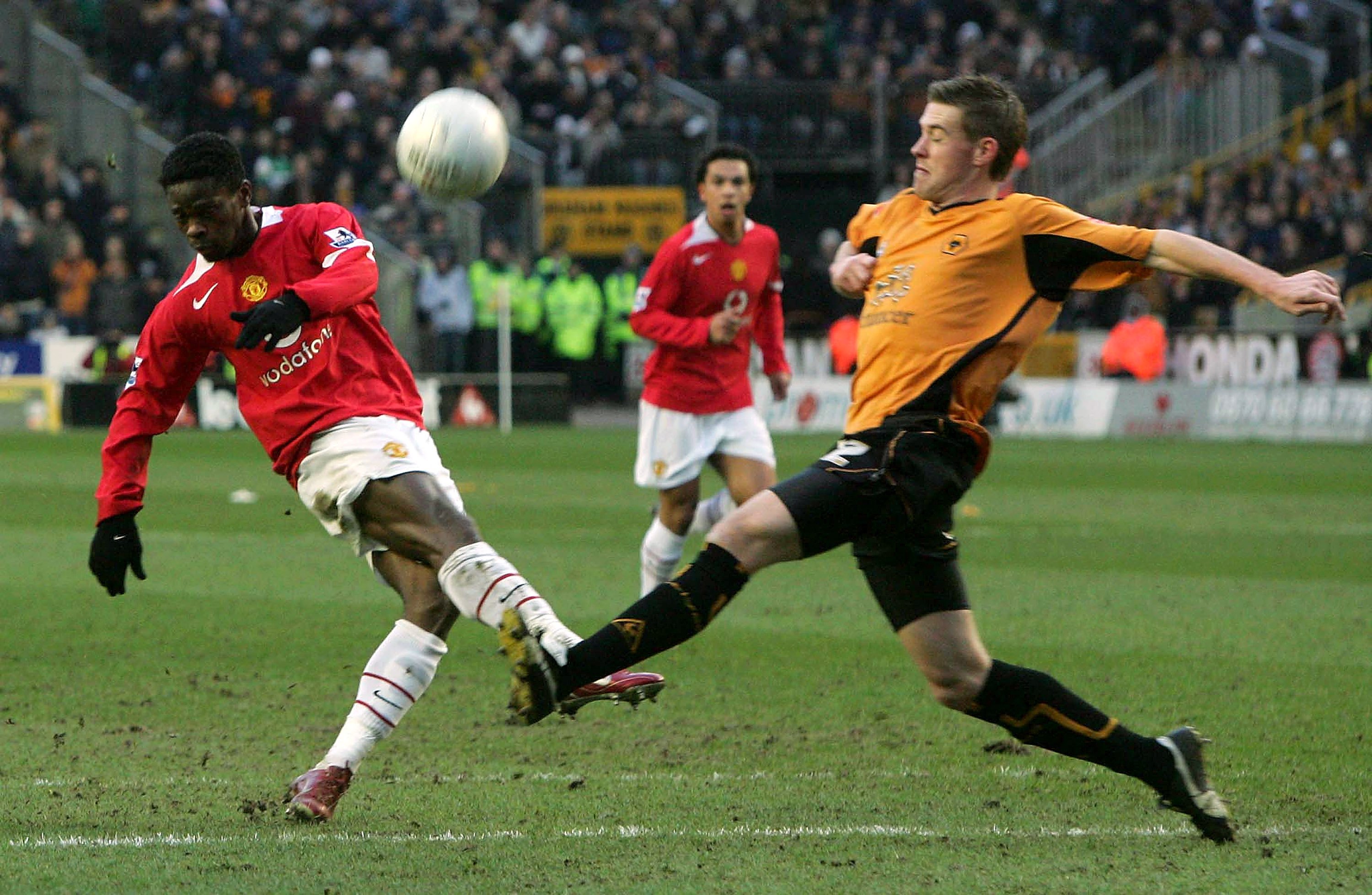 Wolves defender Rob Edwards (right) attempts to block a shot by Louis Saha in a game against Manchester United in January 2006.