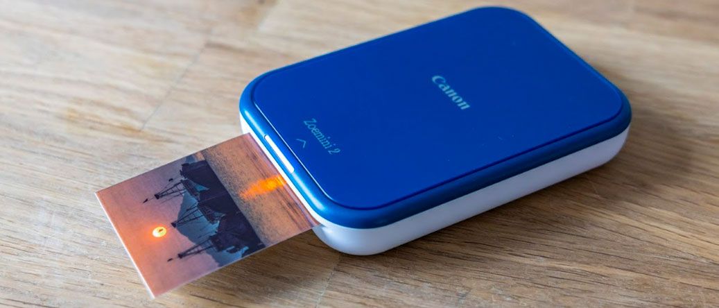 Image shows the Canon IVY 2 Mini photo printer.