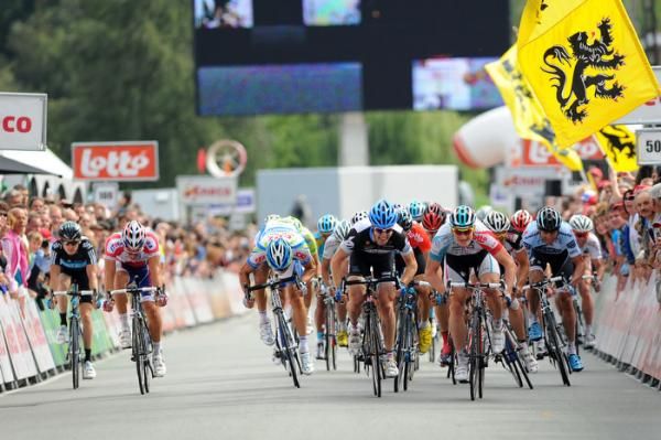 Andre Greipel (Omega Pharma-Lotto) rockets to victory along the left side of the road.