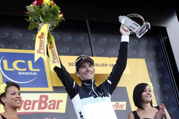 Andy Schleck (Leopard Trek) celebrates atop the stage podium on the Galibier