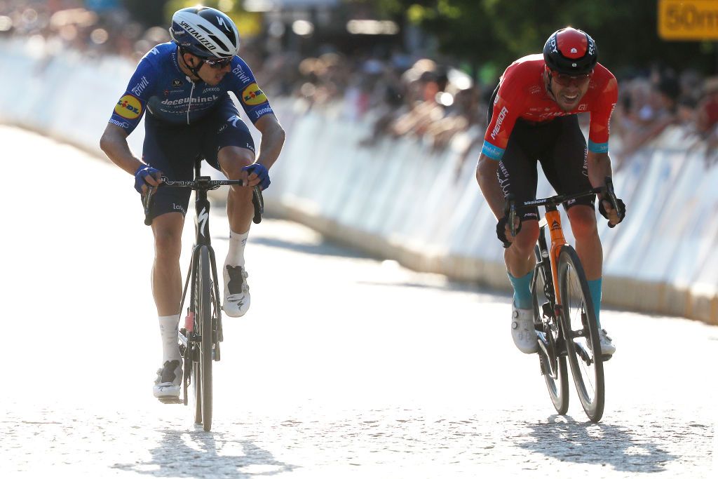 CHELM POLAND AUGUST 09 LR Alvaro Jose Hodeg Chagui of Colombia and Team Deceuninck QuickStep Phil Bauhaus of Germany and Team Bahrain Victorious sprint at finish line during the 78th Tour de Pologne 2021 Stage 1 a 216km stage from Lublin to Chem 212m TourdePologne TDP2021 UCIWT on August 09 2021 in Chelm Poland Photo by Bas CzerwinskiGetty Images