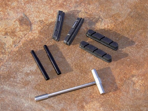 Brake pads, valve extenders and a spoke wrench