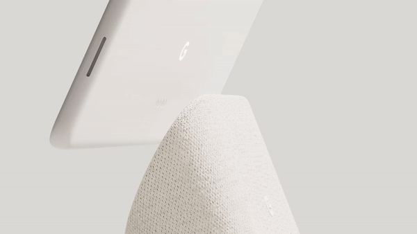 The new Pixel tablet attaching to its Charging Speak dock.