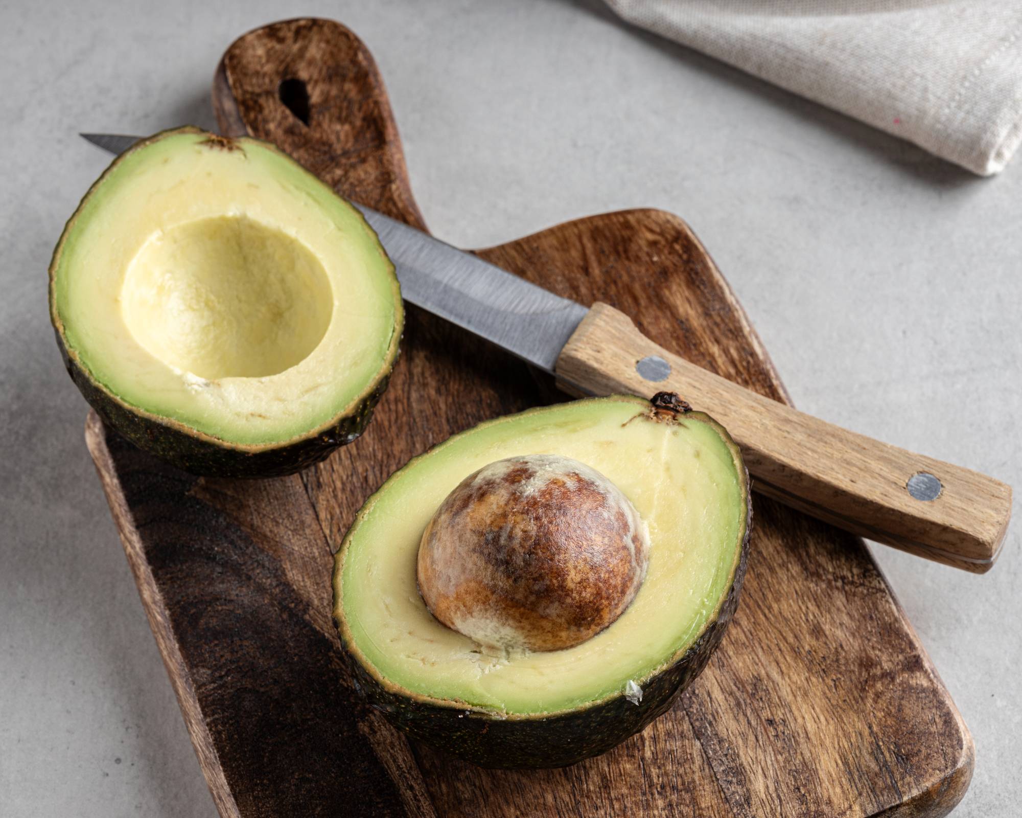 Avocado sliced with pit exposed