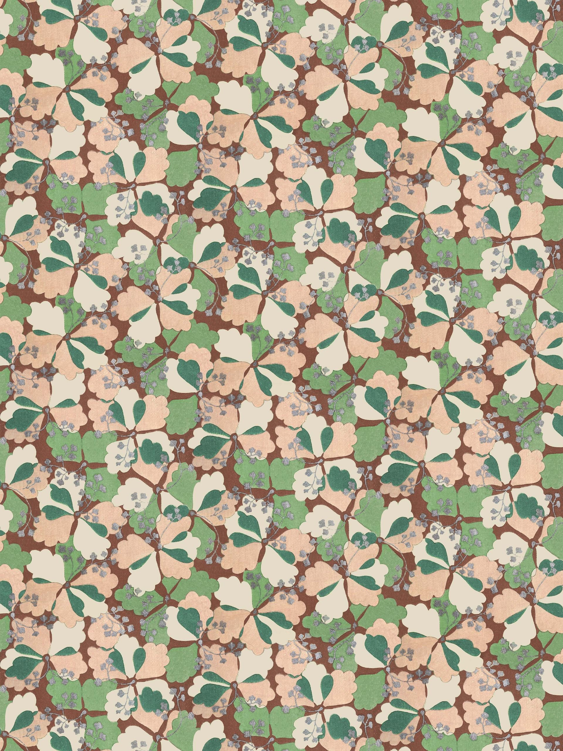 A sakura-flower print wallpaper in tones of dark red, green and peach